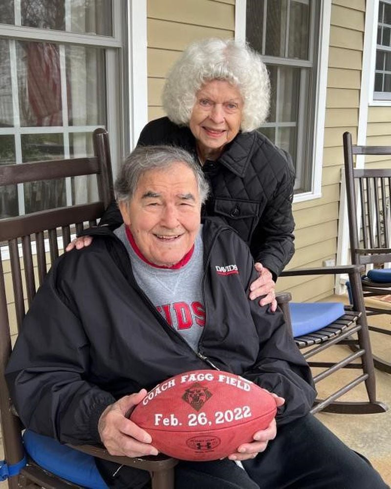 Former Georgia Tech assistant coach Dave Fagg with his wife, Barbara, taken at their home in Davidson, N.C., in 2022. The occasion was the announcement that the field at Davidson College’s new stadium was to be named in his honor. Fagg was a star athlete at Davidson and twice its head coach. (Davidson College Athletics)