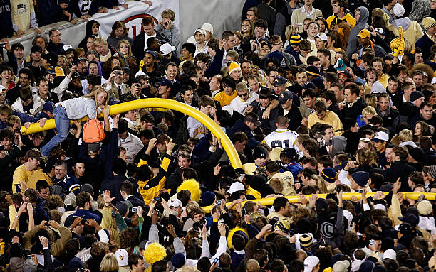 fans-carry-the-goal-post-from-the-north-end-zone-after-the-georgia-picture-id91972086
