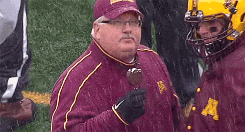 minnesota-coach-eating-a-dilly-bar-in-snow.gif
