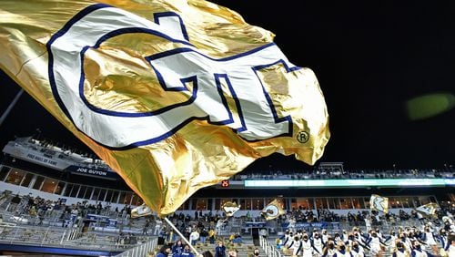Georgia Tech fans cheer  during the second half of an NCAA college football game at Georgia Tech's Bobby Dodd Stadium in Atlanta on Saturday, November 28, 2020.